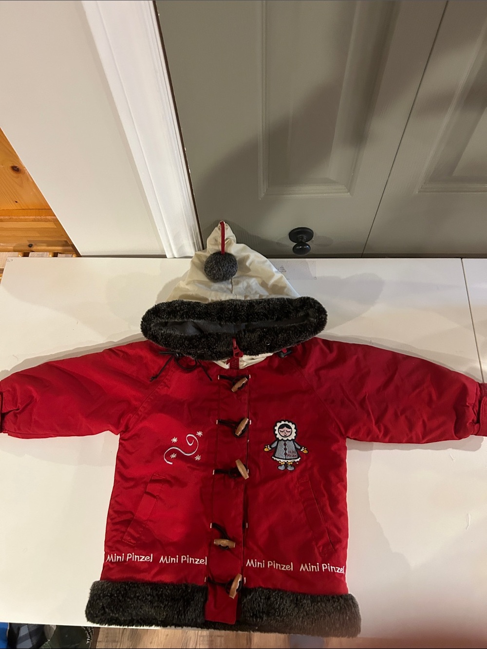 Red Hooded Puffer Jacket with Faux Fur Trim